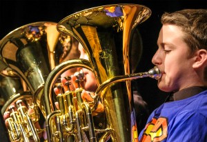 Boys play baritone horns