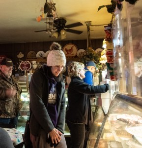 Customer looks in display case