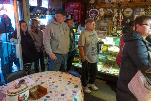 Customers wait in line