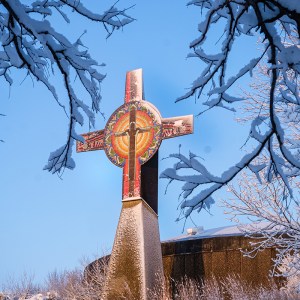 Snow covered tree branches frame the Tower of the Four Winds in Black Elk-Neihardt Park Friday Morning in April.